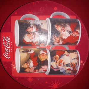 Coca cola Christmas mugs.